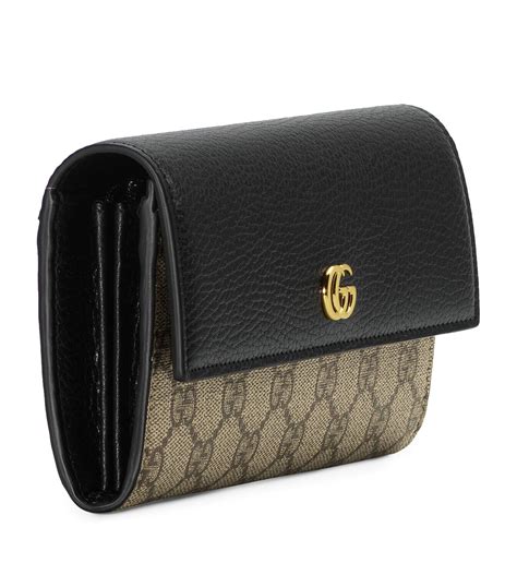 gucci gg embossed wallet|Gucci gg marmont continental wallet.